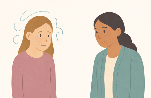 Illustration of a worried person talking with a calm, supportive therapist.